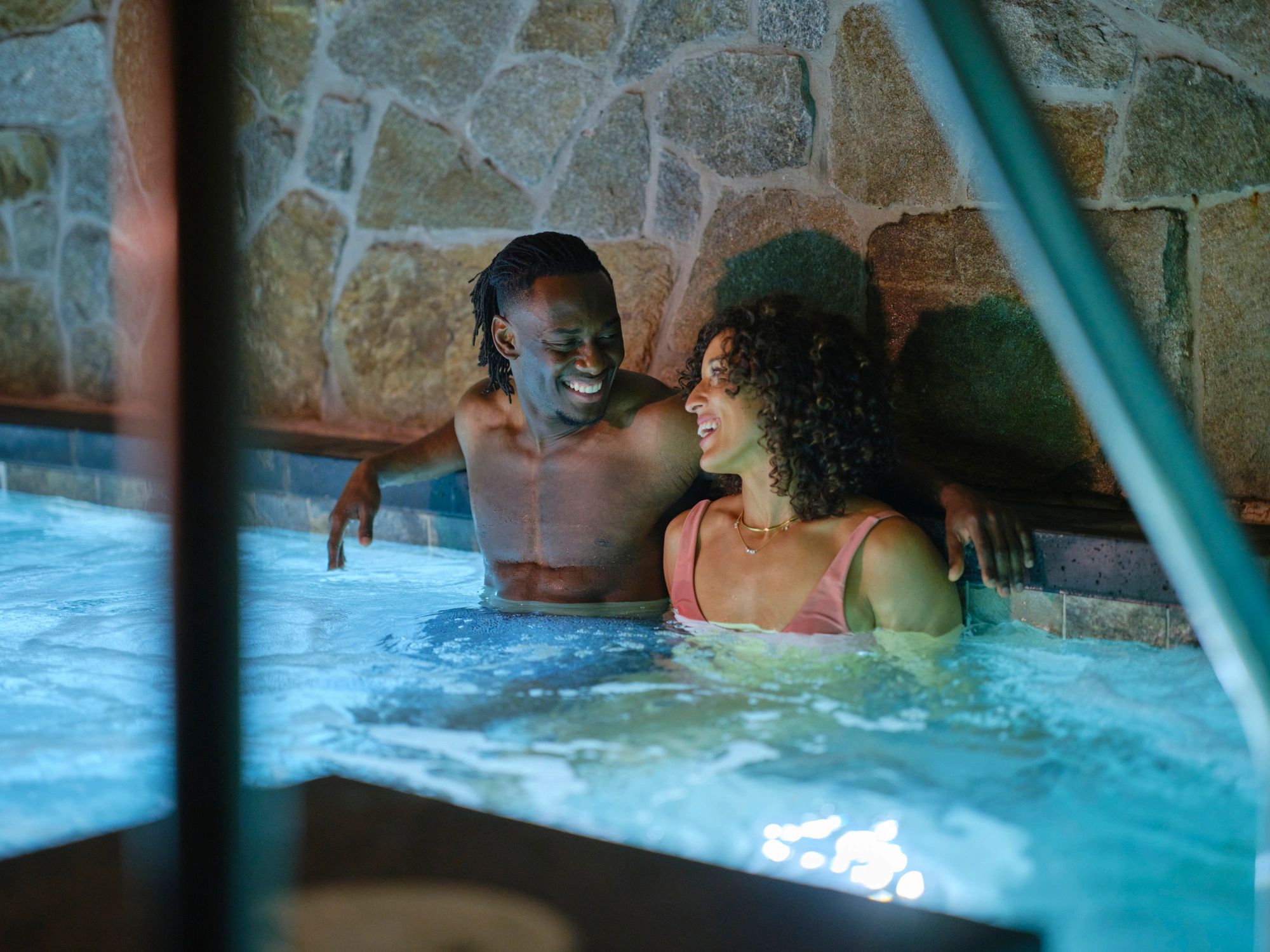 Couple relaxing at a luxury spa, representing restoration and wellbeing