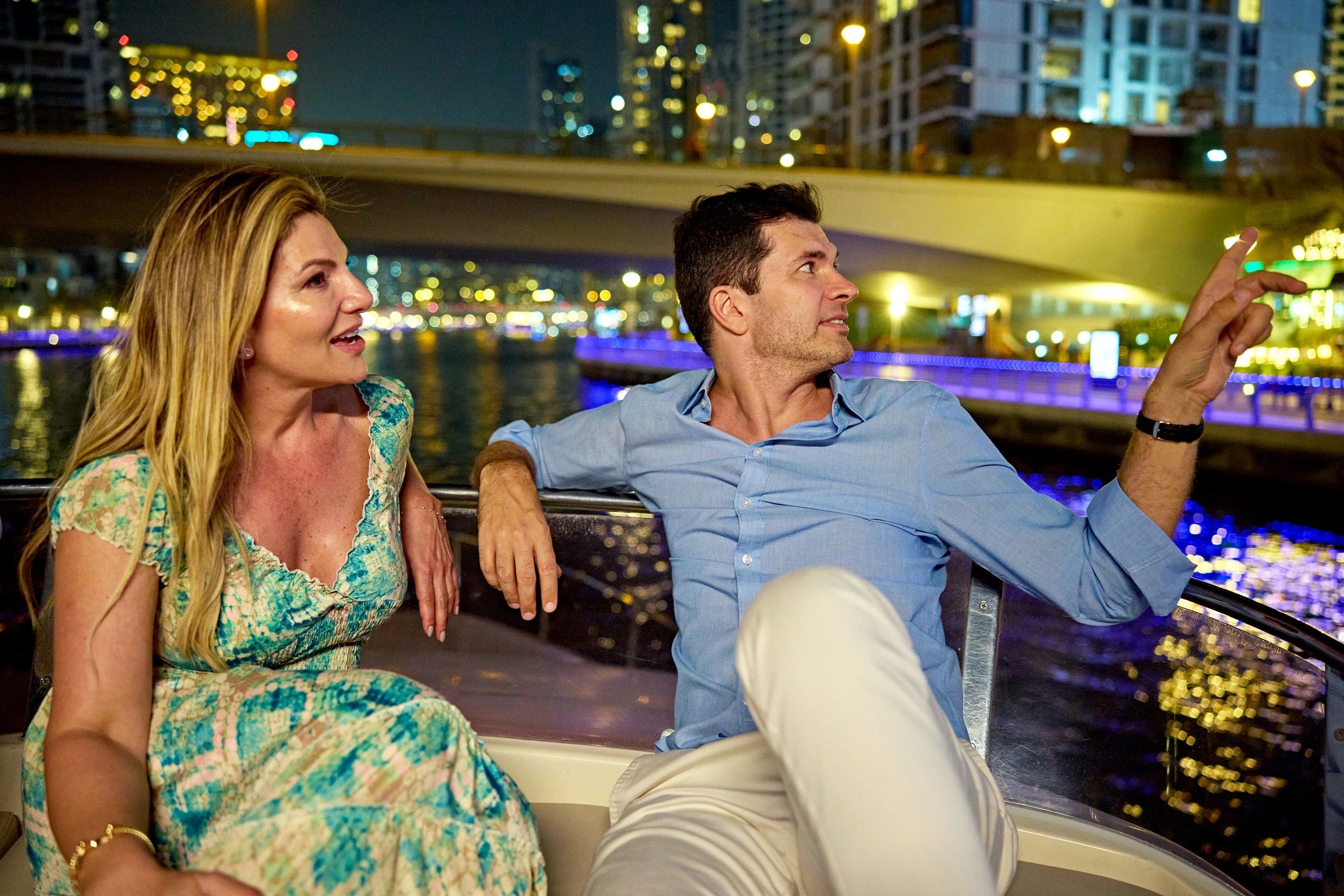 Couple relaxing on a charter yacht at sunset