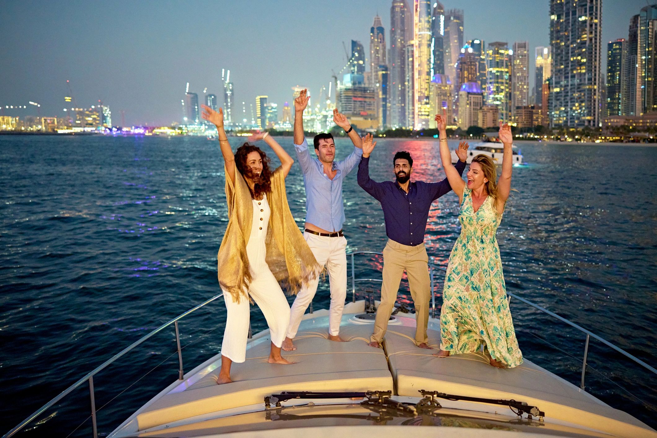 Couples enjoying an evening on a luxury yacht